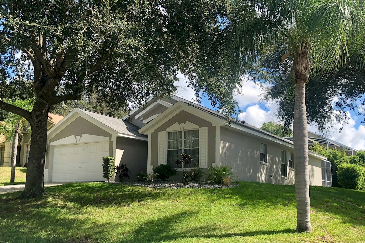 The villa is situated on a large corner plot on a quiet residential street. There is parking for 2 cars on the driveway